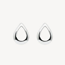 Load image into Gallery viewer, A pair of silver, teardrop-shaped stud earrings against a white background.