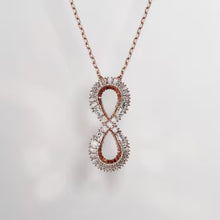 Load and play video in Gallery viewer, Swarovski Hyperbola Pendant
